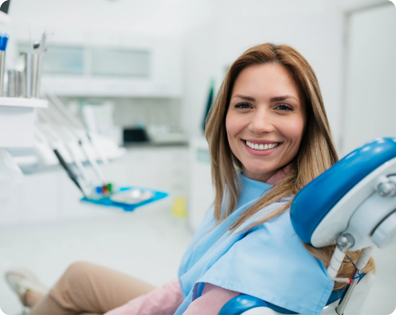 Happy woman at dental appointment